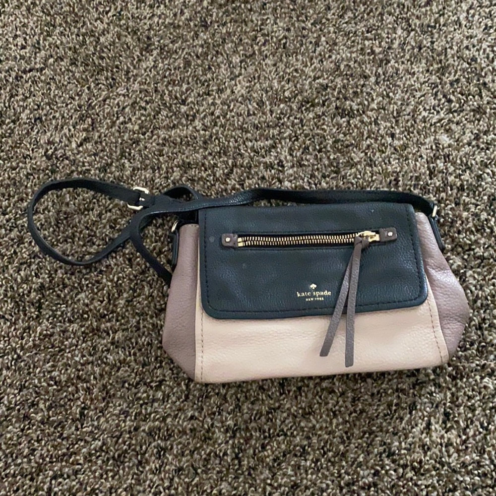 Kate Spade small purple handbag with striped interior
